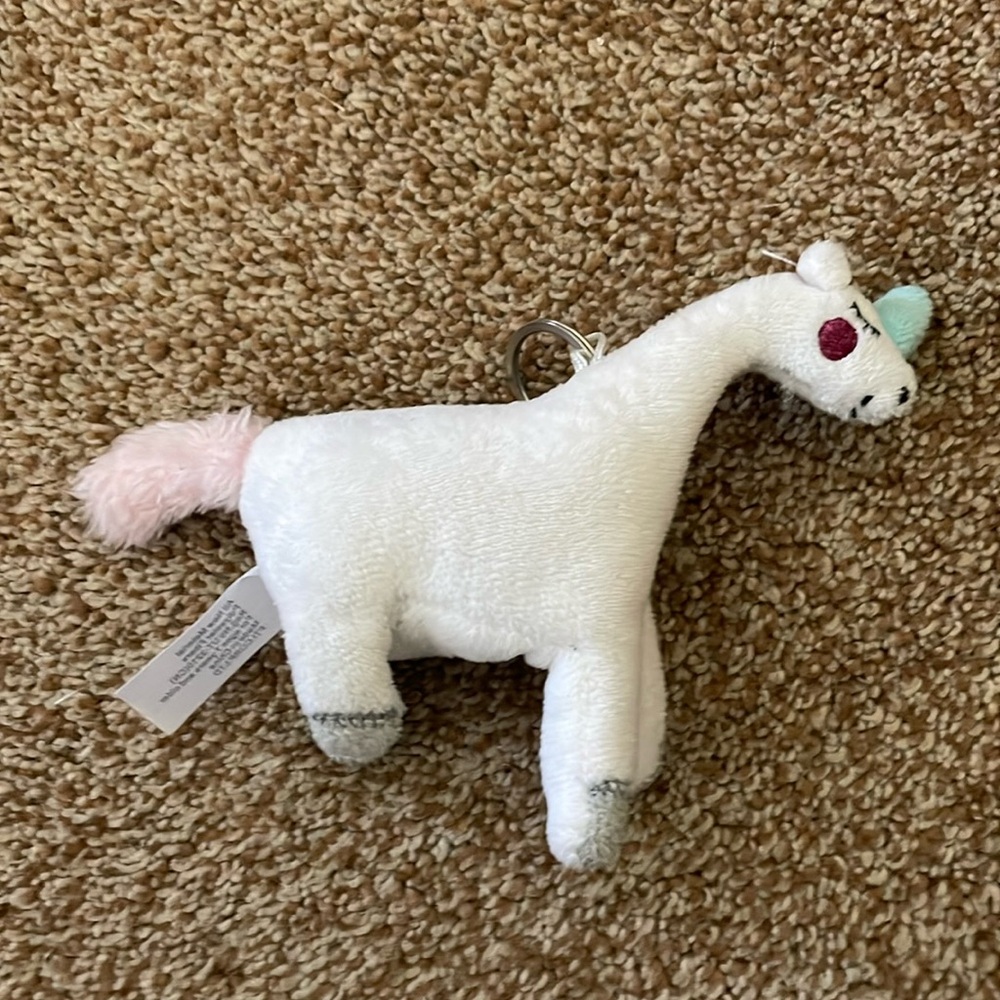 White Plush Unicorn backpack clip